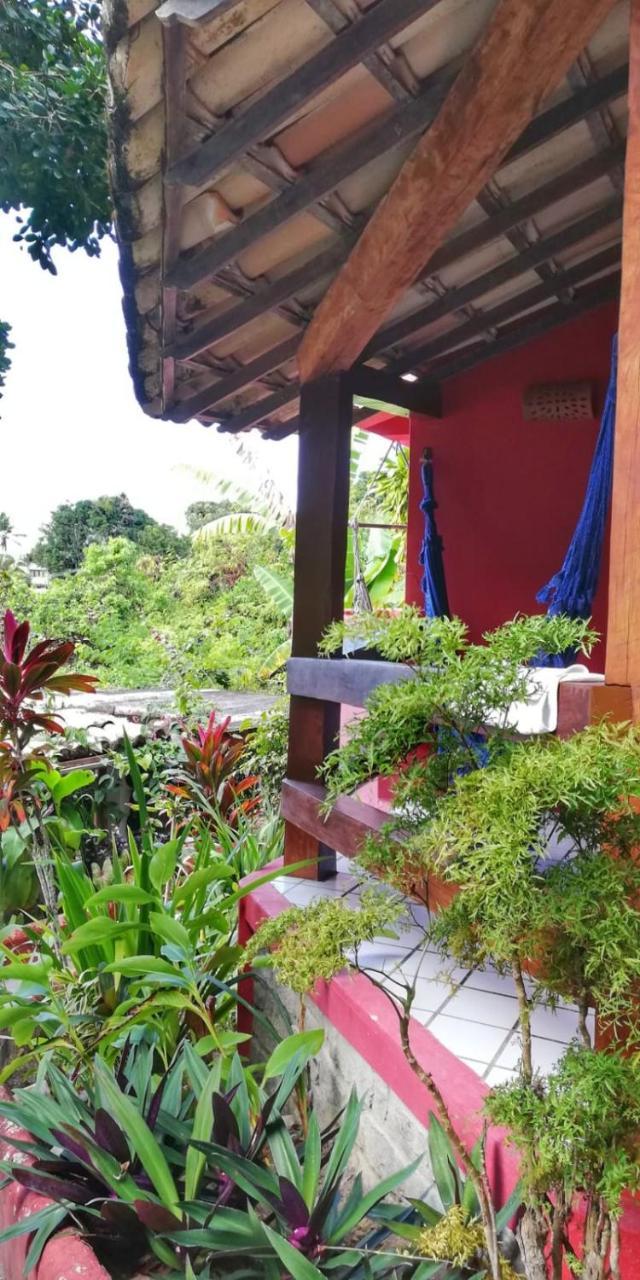 Novos Baianos Hostel E Pousada Porto Seguro Exterior photo A view of the garden at the hotel